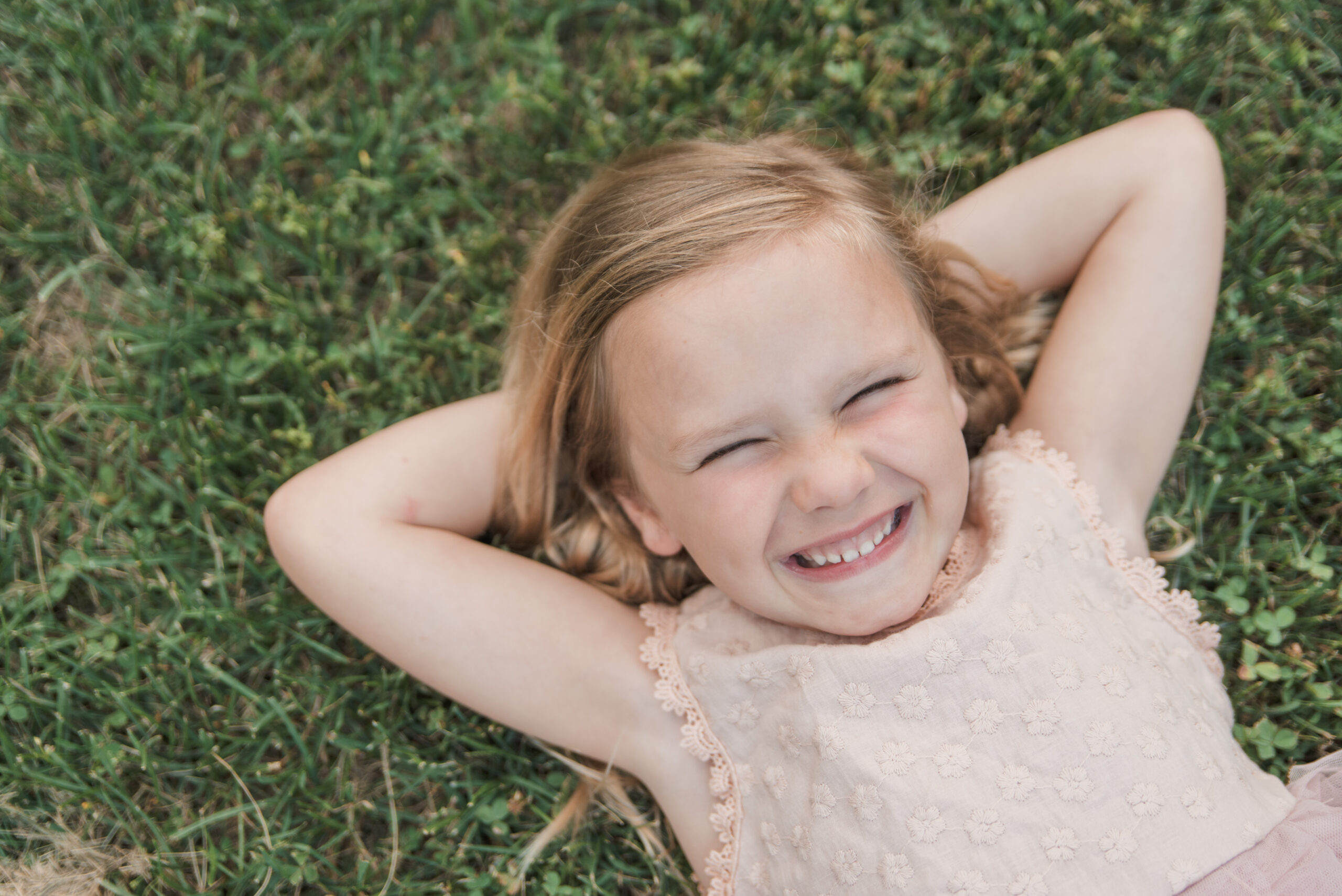 Family posing for a portrait outdoors in Lancaster County