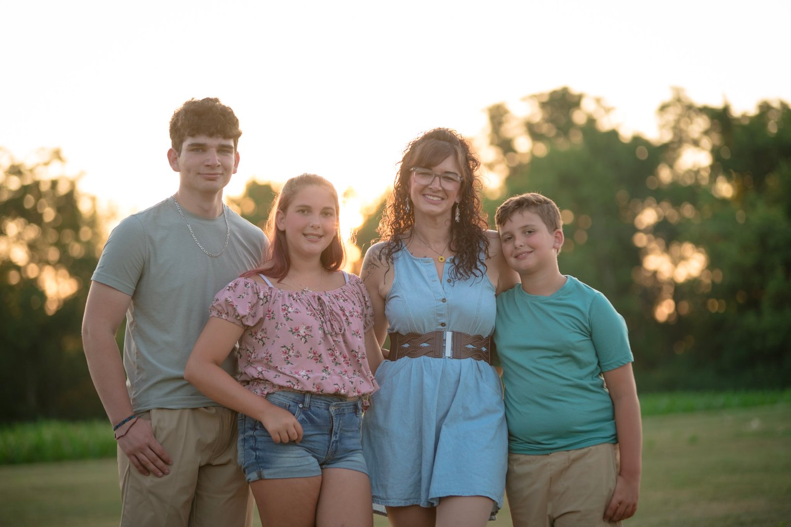 Family posing for a portrait outdoors in Lancaster County by Boltz Photography