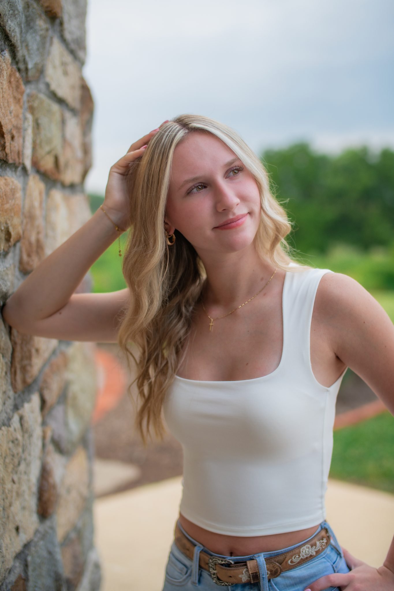 Ephrata High School senior portrait against a stone wall at Middle Creek, Lancaster County PA