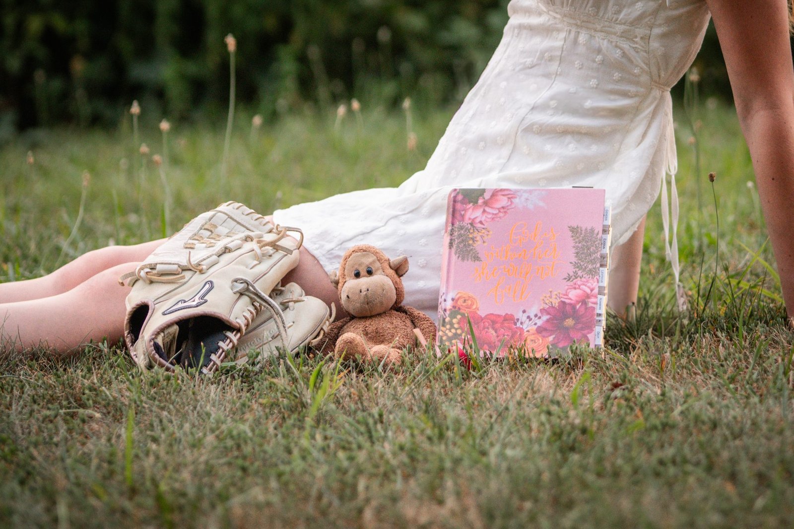 Senior session detail photo, softball glove, bible, and stuffed monkey at Middle Creek PA